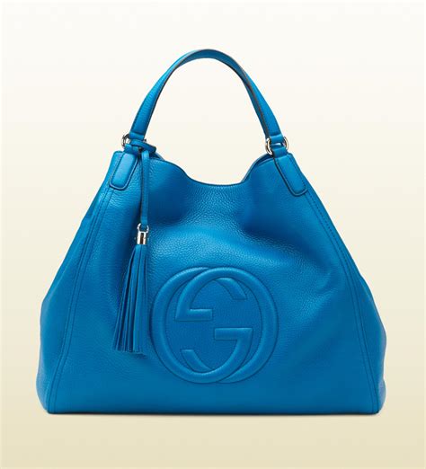 gucci blue surcingle purse|Gucci pouch farfetch.